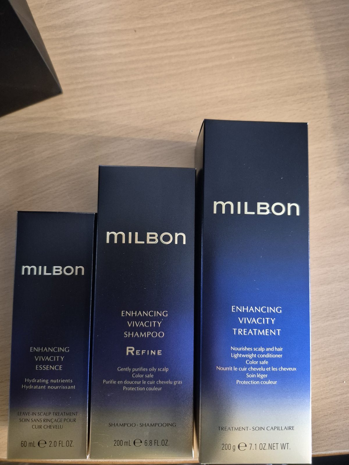 Drie verpakkingen Milbon Enhancing Vivacity: essence, shampoo en treatment